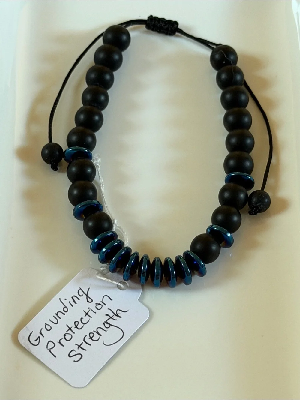 MENS Adjustable Matte Black Bead Bracelet with Blue Accent Discs